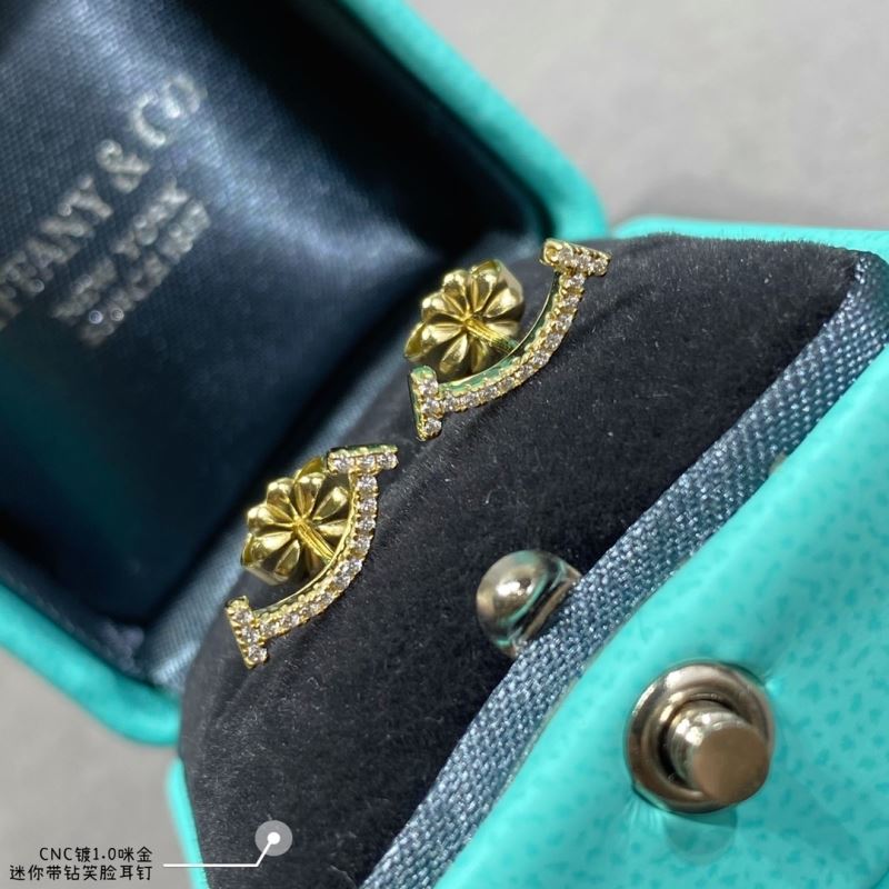 T*f*ny earrings